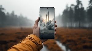 Hand holding phone with rocket launch