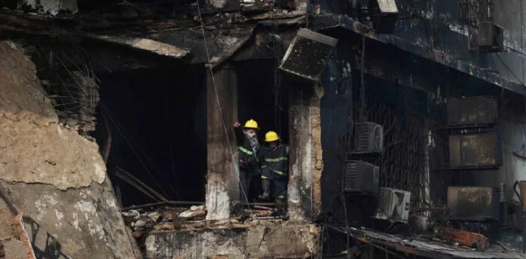rescuers inside the burnt gul plaza