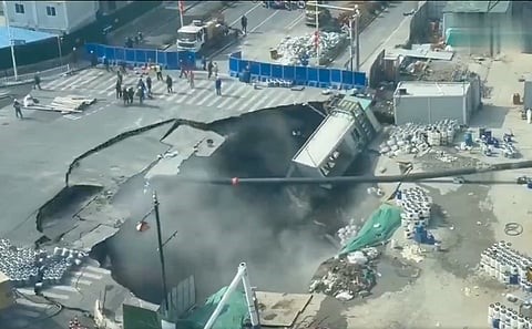 Massive Sinkhole Swallows Shanghai Road Intersection