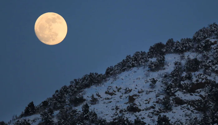 Moon view above the mountain